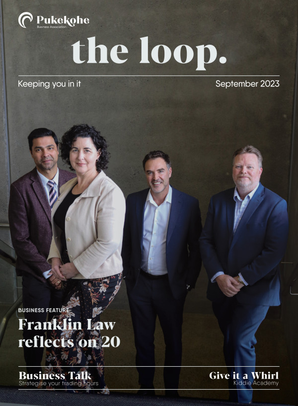 Loop Magazine Cover with Staff from Franklin Law